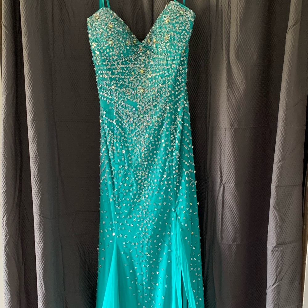 Bright blue sequin prom dress with slit
